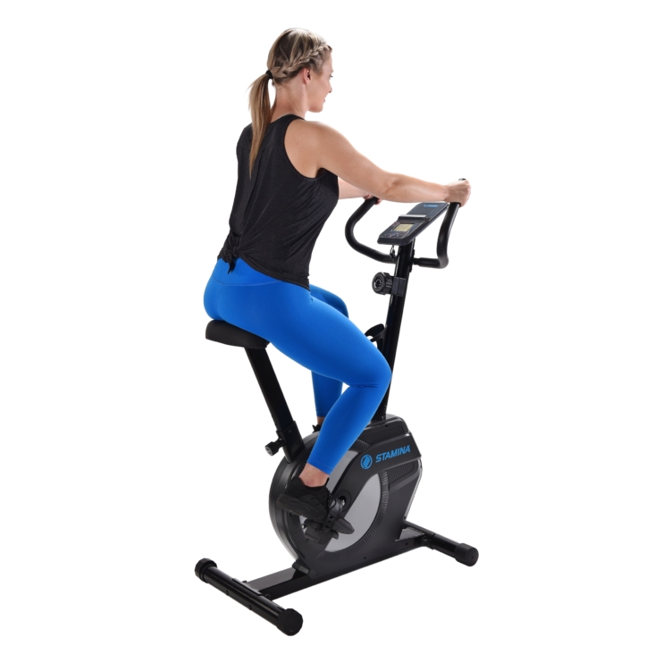 Woman workout on Stamina Upright Exercise Bike 1308